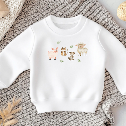 Bügelbild Bauernhoftiere im Aquarell-Stil mit Schwein, Katze, Hund und Schaf, aufgebügelt auf weißem Kinder-Sweatshirt
