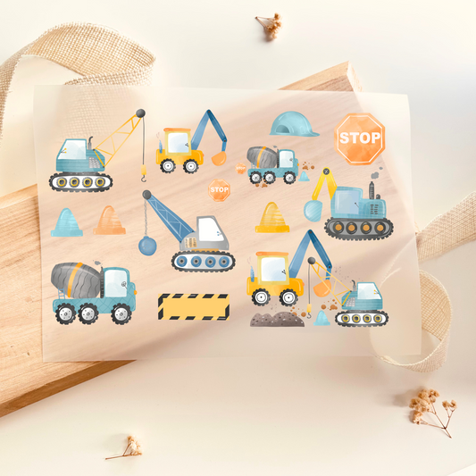 Bügelbild-Set mit Baufahrzeugen wie Kran, Bagger und Mischer im Aquarell-Stil in Blau und Gelb zum Aufbügeln für Kinder
