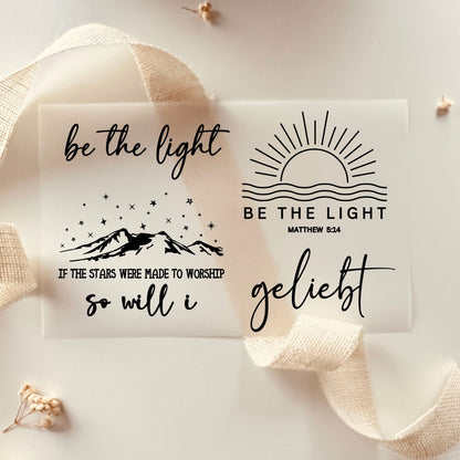 Bügelbild-Set mit Sprüchen wie "Be the Light", "Geliebt" und "If the Stars Were Made to Worship, So Will I" in Schwarz