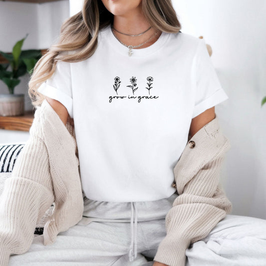 Bügelbild mit kleinen Blumen-Strichzeichnungen und Schriftzug "Grow in Grace" im minimalistischen Stil