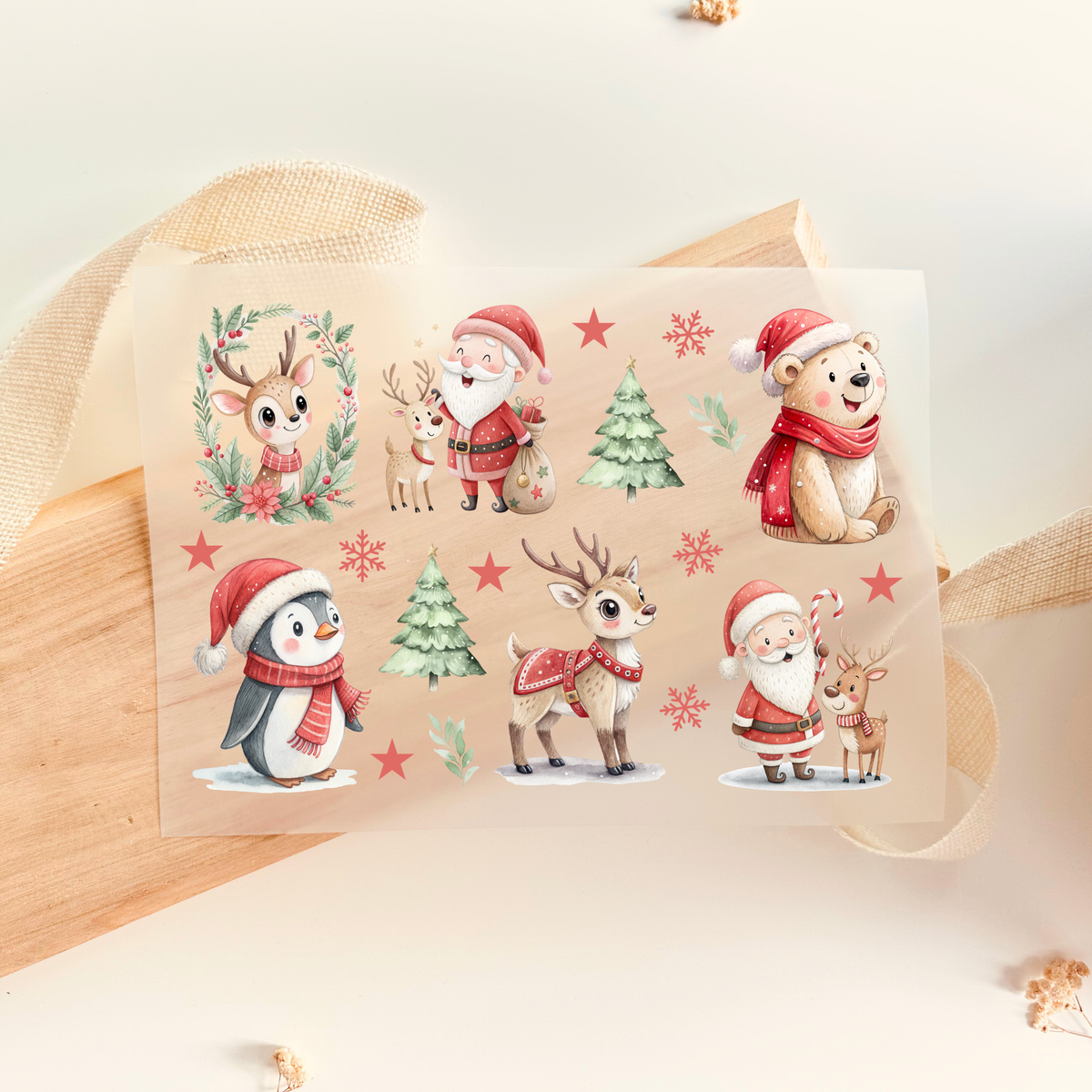 Bügelbild Bogen Weihnachten mit Rentier, Weihnachtsmann, Pinguin, Teddy, Tannenbaum und Sternen. DTF Transfer im Aquarell Stil zum Aufbügeln auf Säckchen und Kinderkleidung