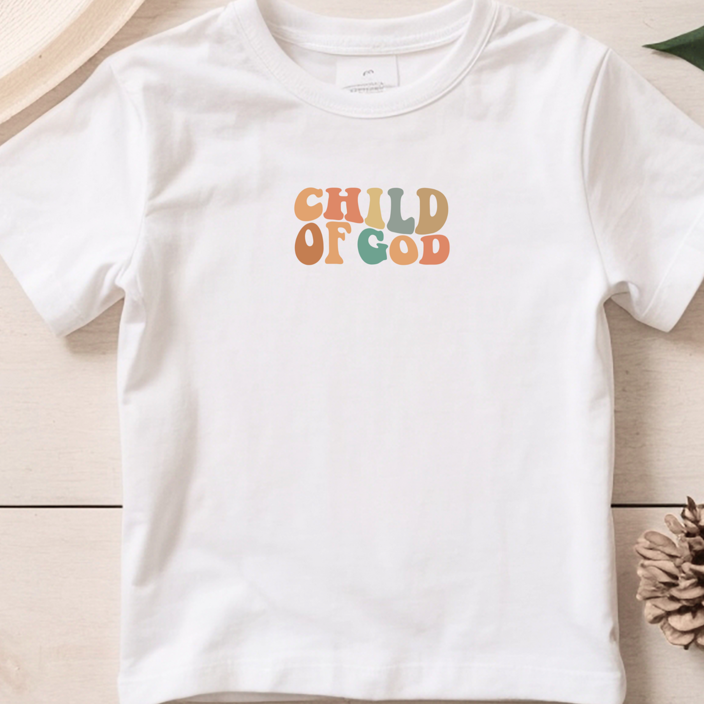 Bügelbild mit Schriftzug "Child of God" im bunten Retro-Stil für Kinder