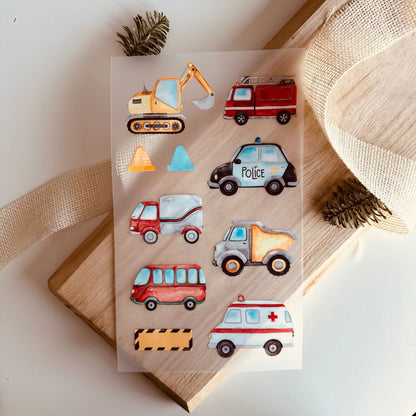 Bügelbild-Set mit Fahrzeugen wie Feuerwehrauto, Polizei, Bagger und Krankenwagen im Aquarell-Stil für Kinder