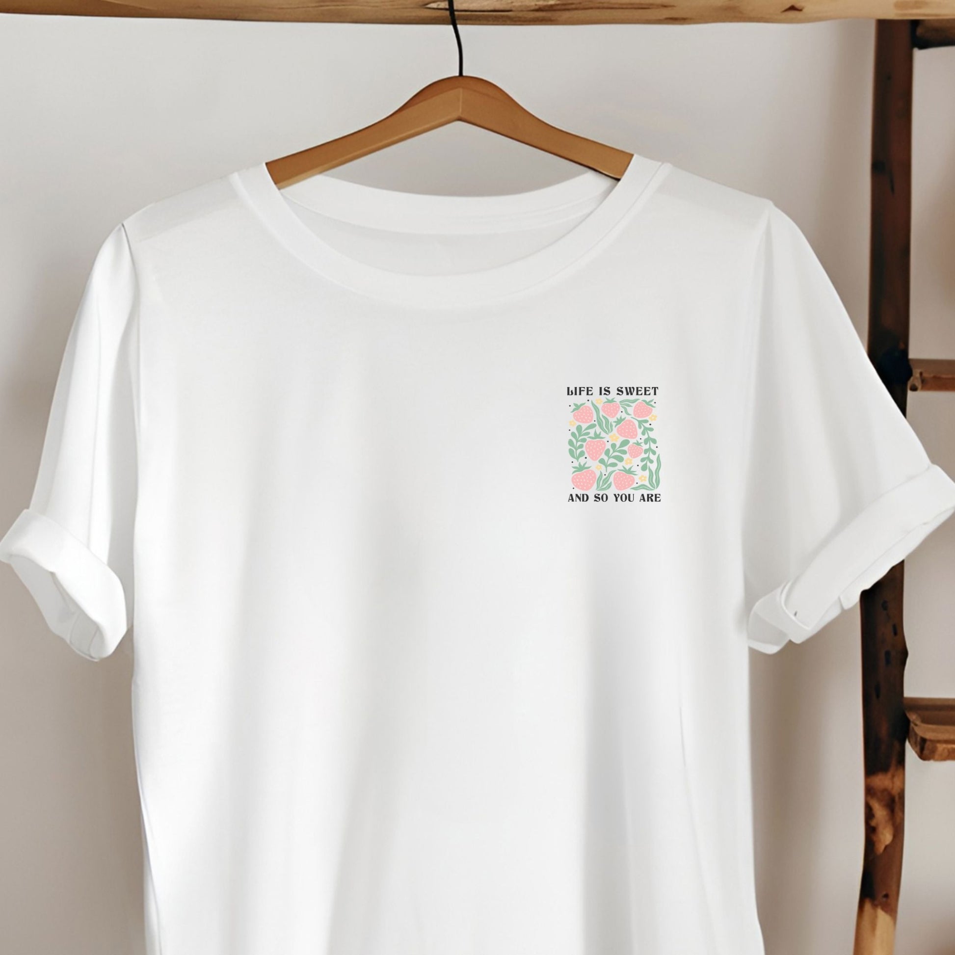 Bügelbild mit floralem Motiv und positivem Spruch in Pastellfarben zum Aufbügeln