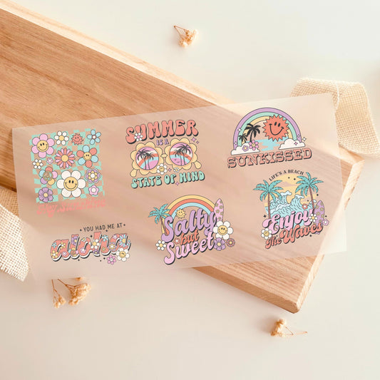 Bügelbild-Set mit Retro-Sommer-Designs wie "Summer State of Mind", "Sunkissed" und "You Had Me at Aloha" in Pastellfarben zum Aufbügeln