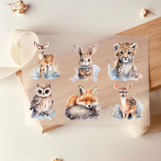 Bügelbild-Set mit Wintertieren wie Reh, Hase, Leopard, Eule und Fuchs im Aquarell-Stil mit Schnee für Kinder